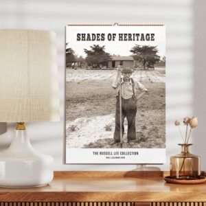 Vintage farmer photo on wall calendar display.