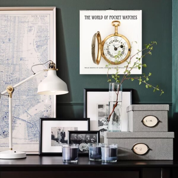 Stylish desk with pocket watch calendar and decor.