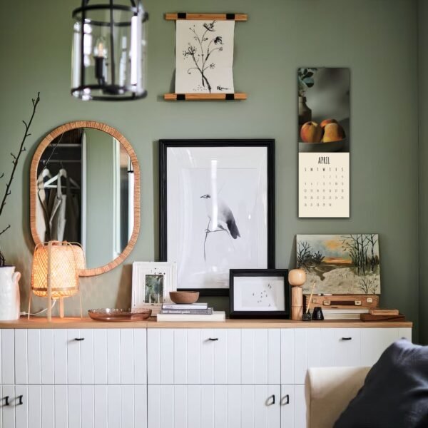 Modern interior with art, mirror, and calendar display.
