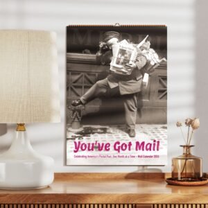 2026 vintage mailman calendar on wooden shelf.