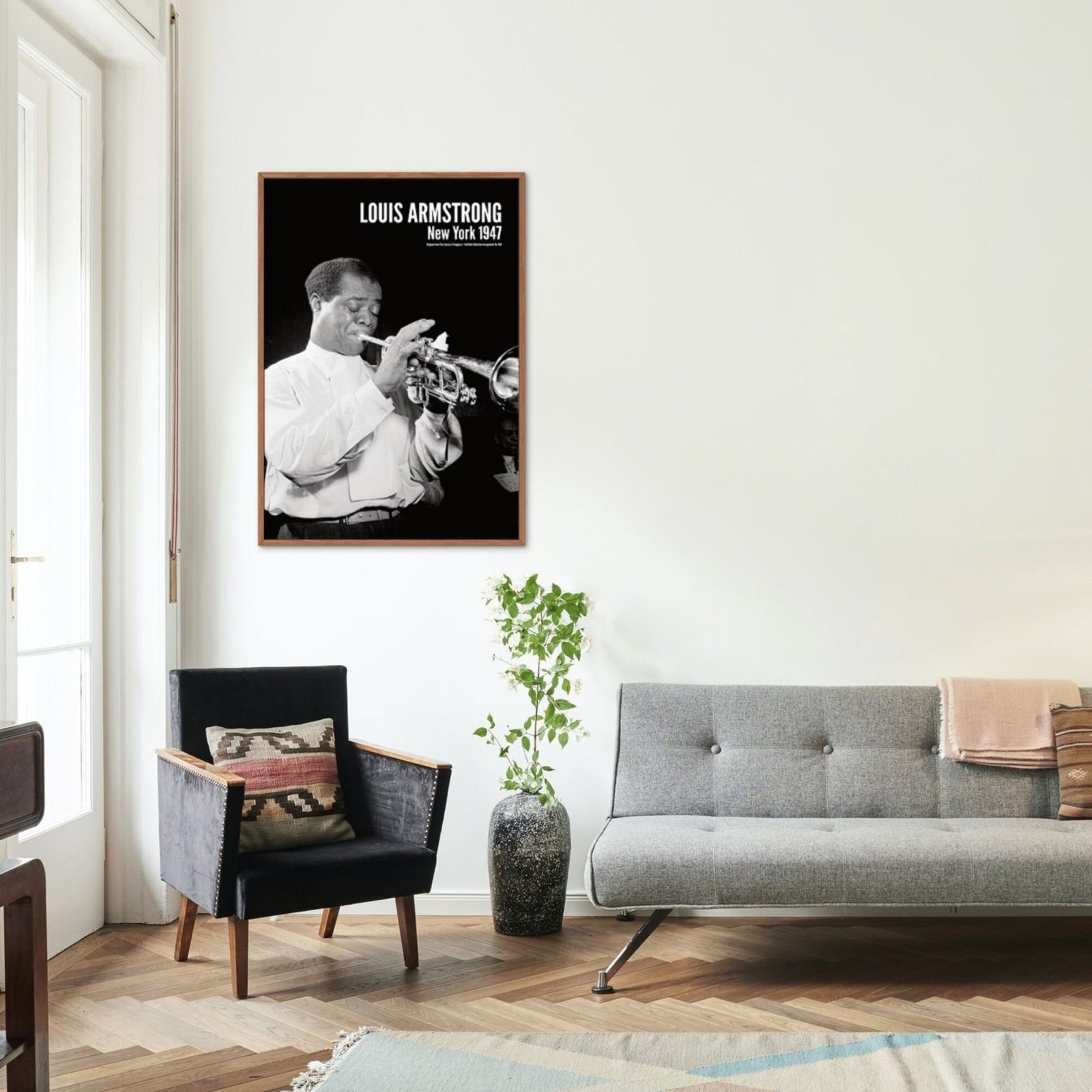 Stylish living room with trumpet player poster.
