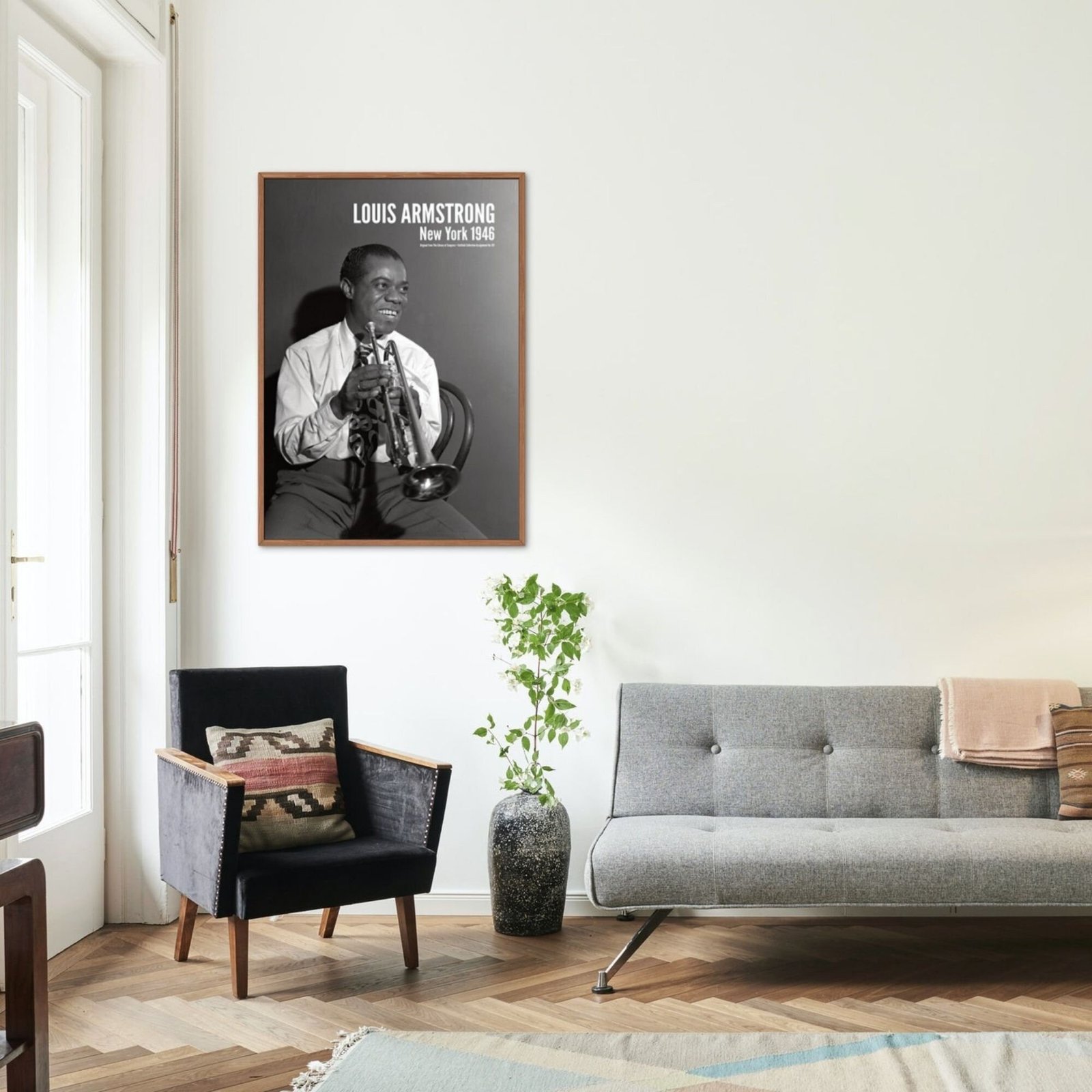 Living room with framed jazz musician photo