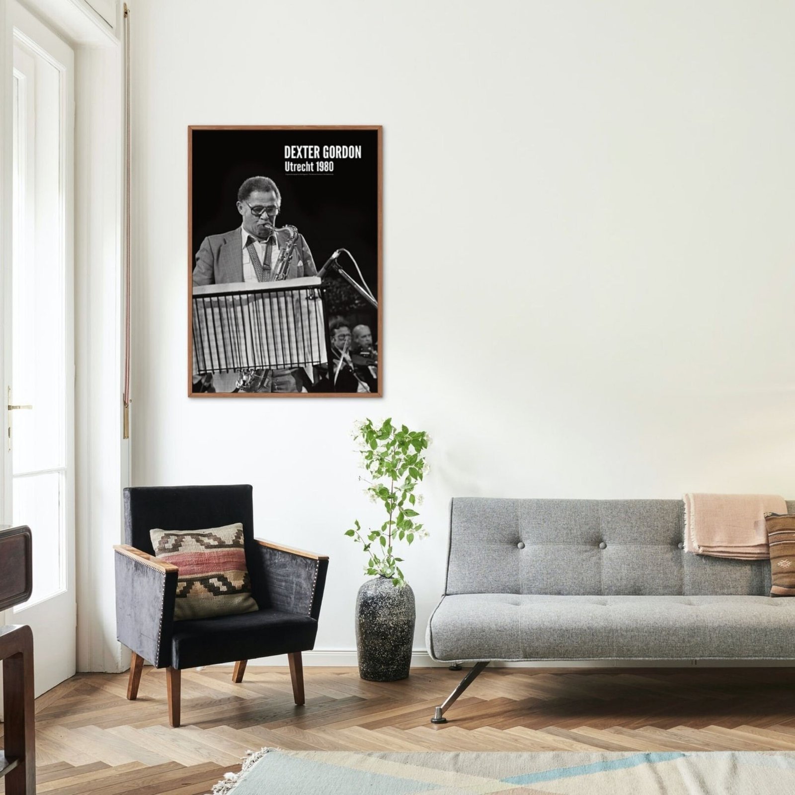 Stylish living room with framed jazz poster on wall.