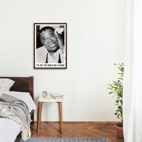 Bedroom with framed music poster on wall.