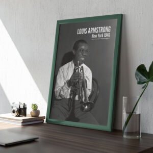 Framed black and white photo on a desk.