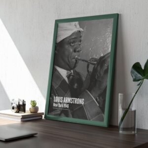 Framed Louis Armstrong photo on desk