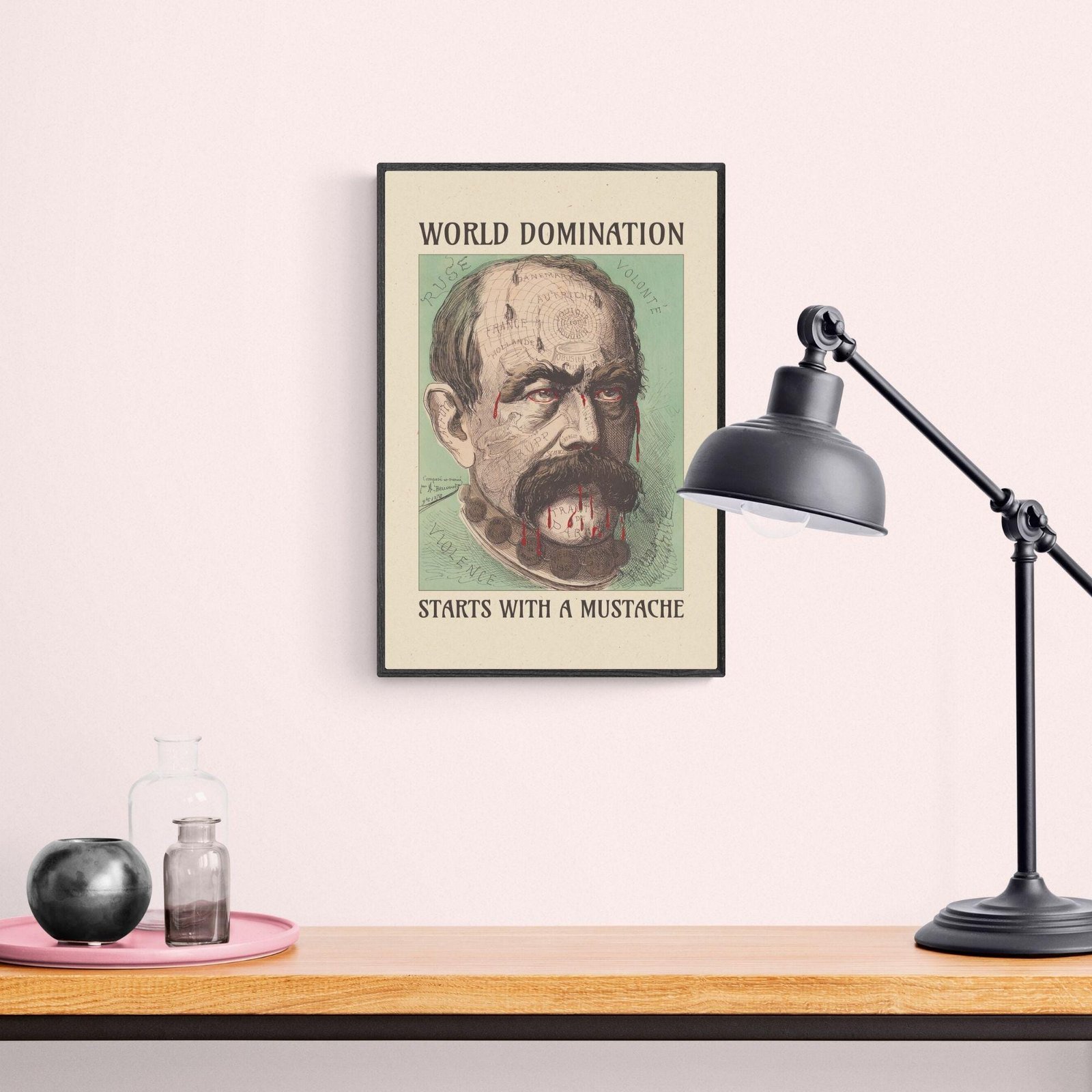 Framed mustache art with lamp and shelf decor.