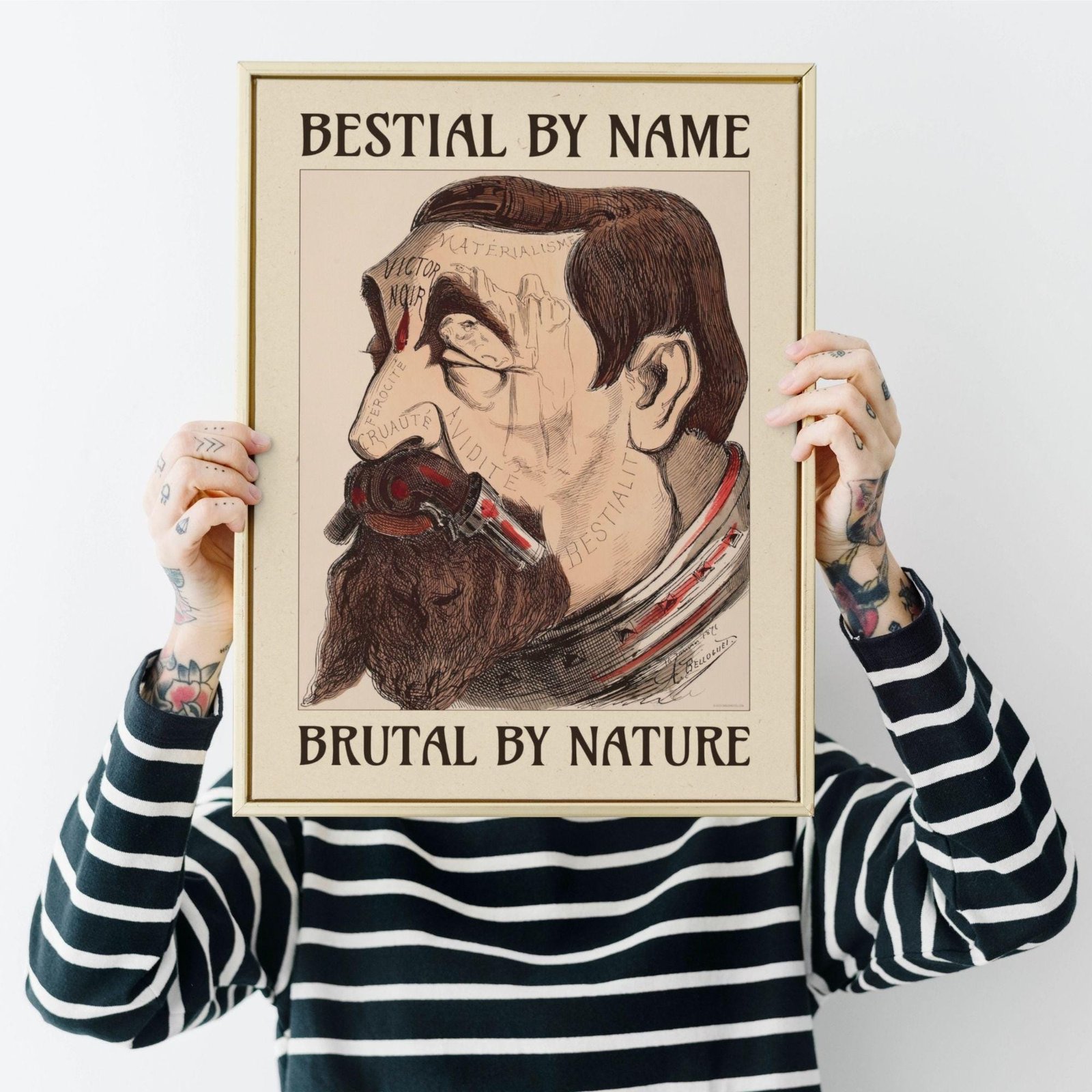 Person holding a satirical illustration poster.