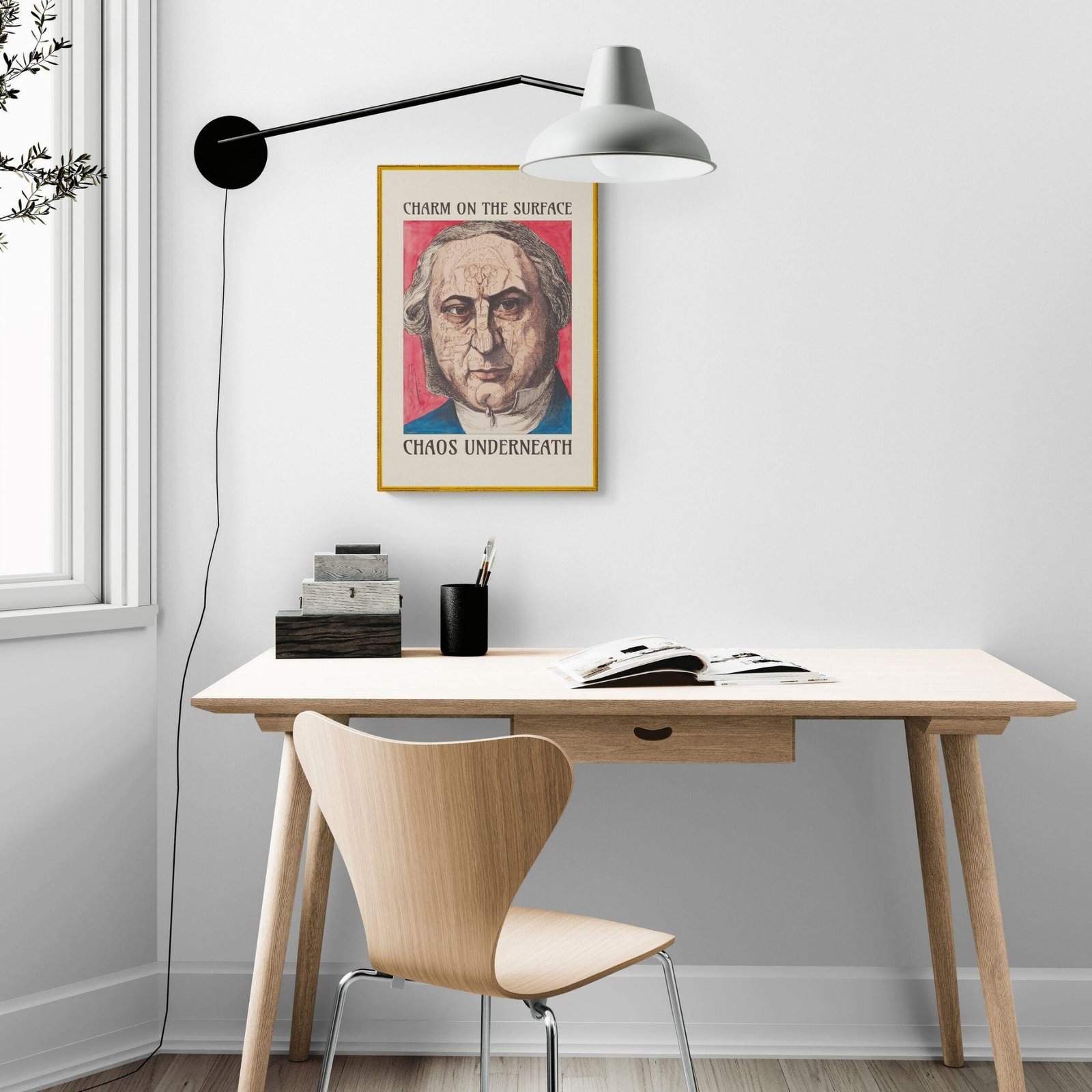 Minimalist desk with modern wall art.