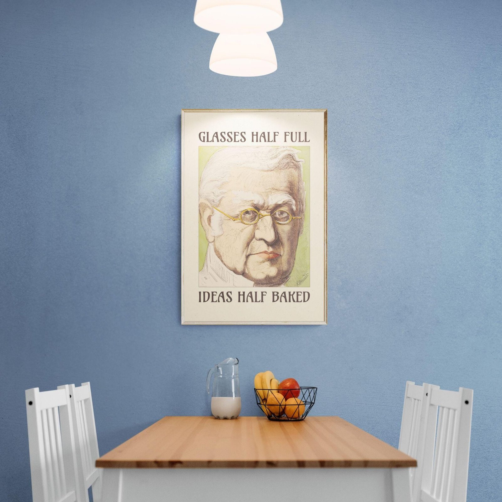 Dining area with humorous wall art and fruit
