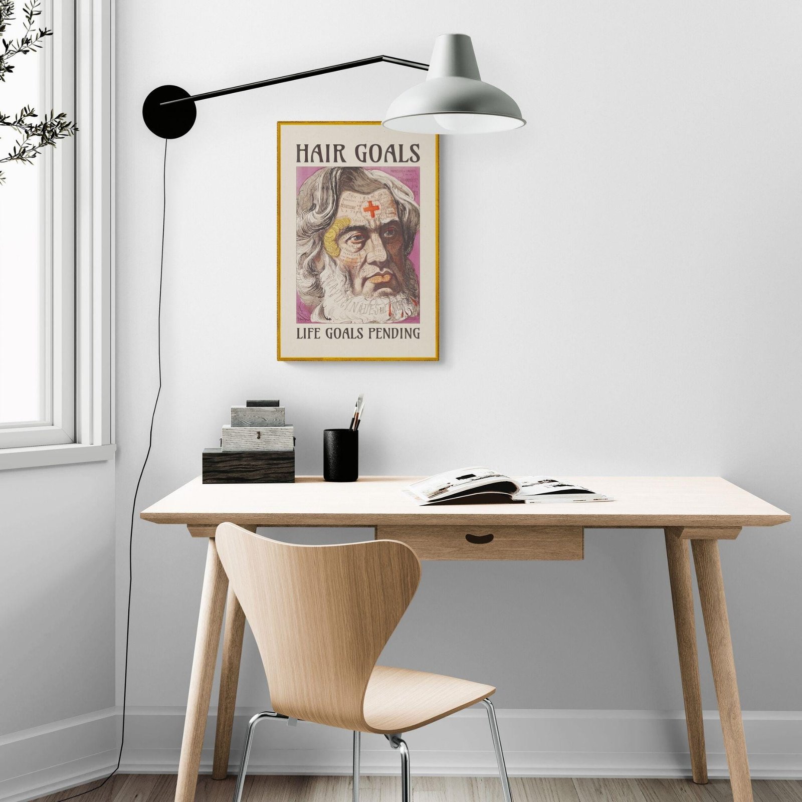 Stylish workspace with hair goals poster
