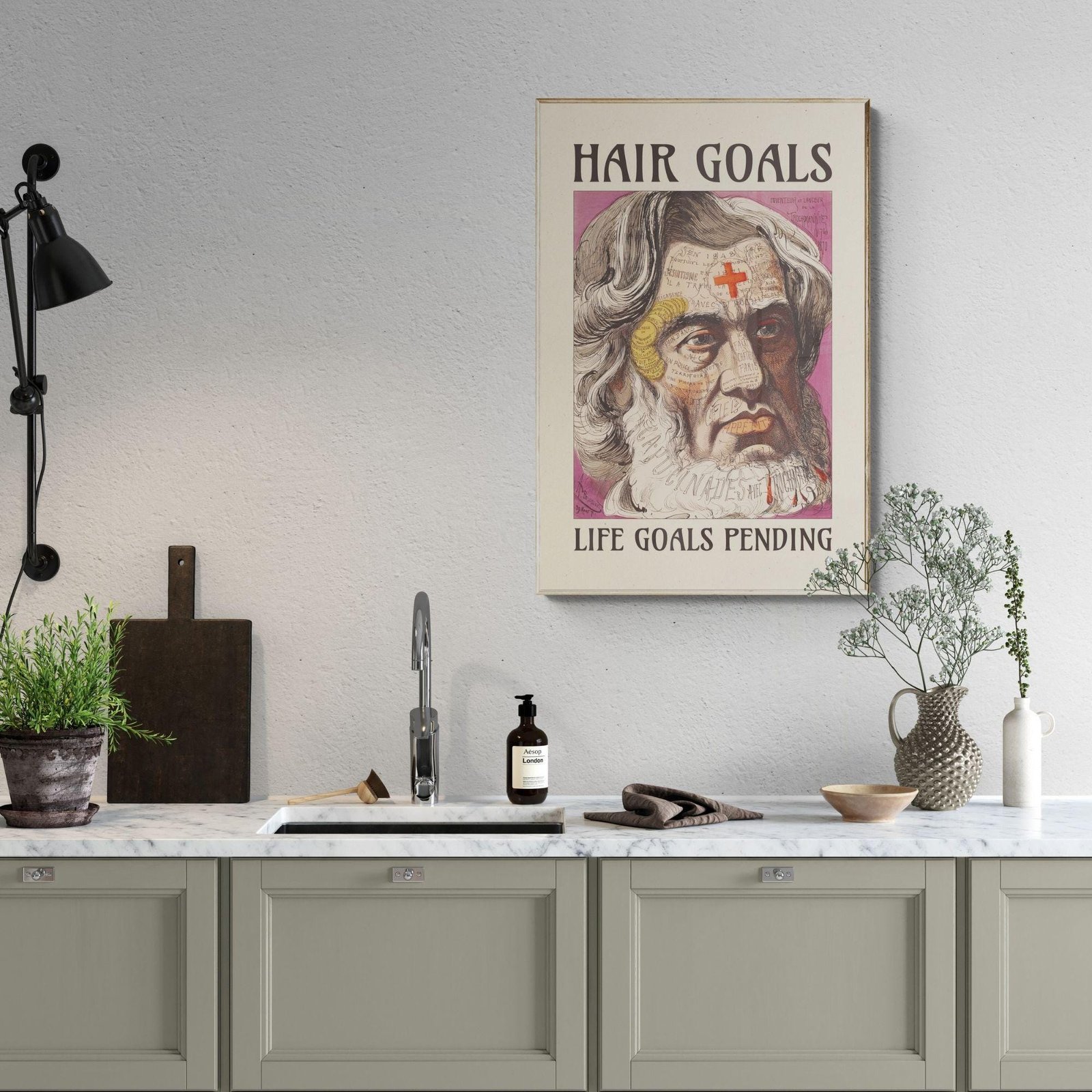 Kitchen with quirky hair goals poster on wall.