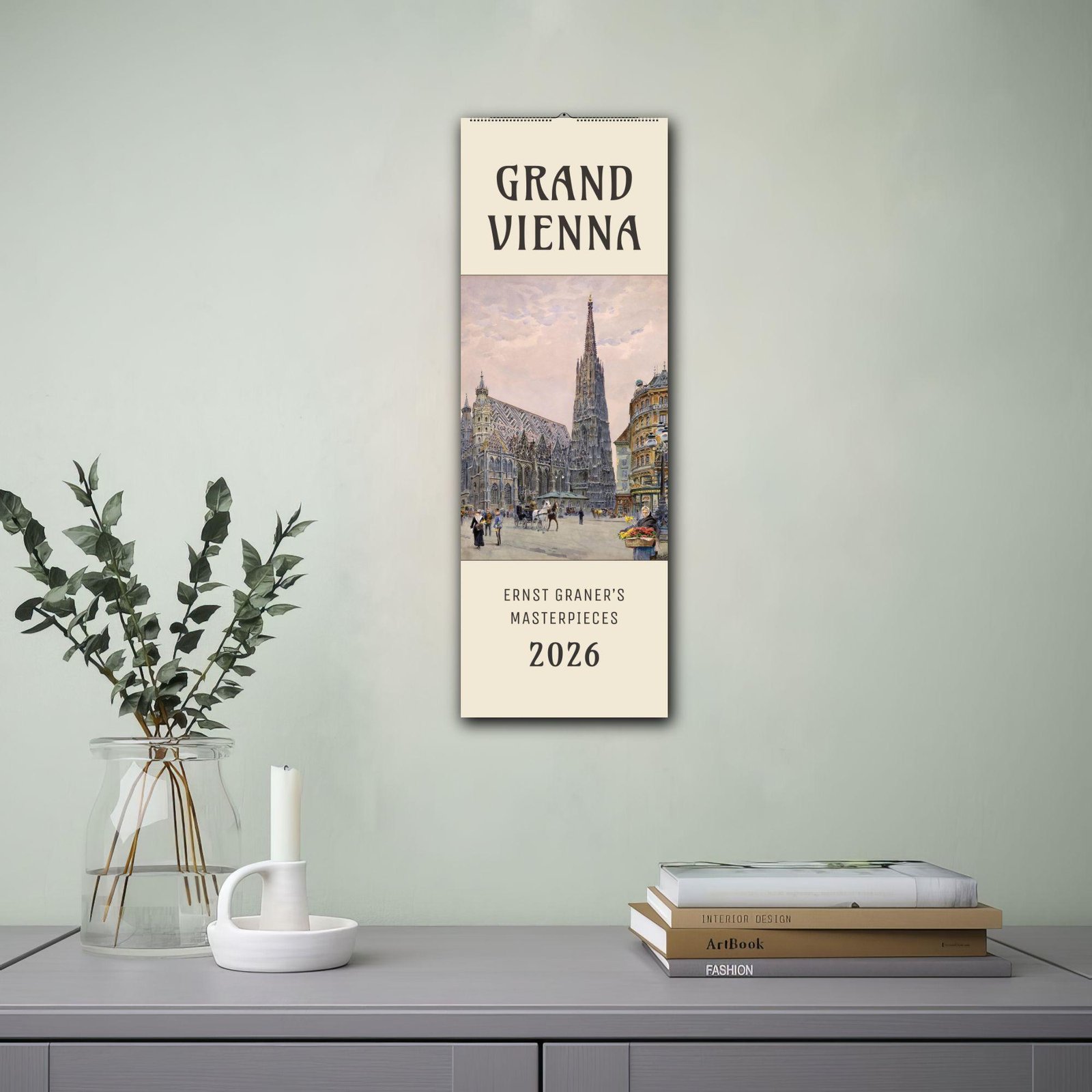 Grand Vienna 2026 calendar on wall with plant