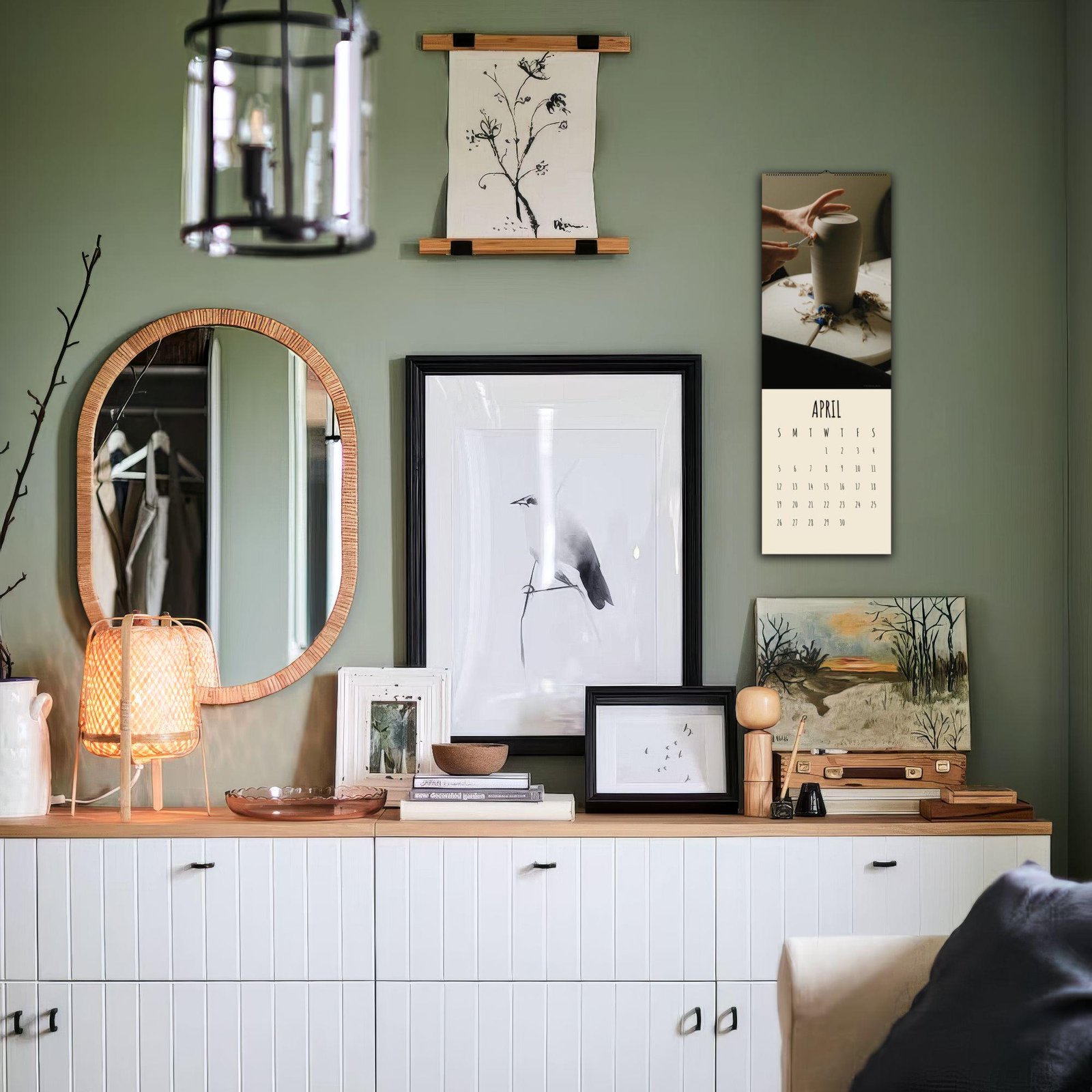 Stylish green room with art and decor elements.