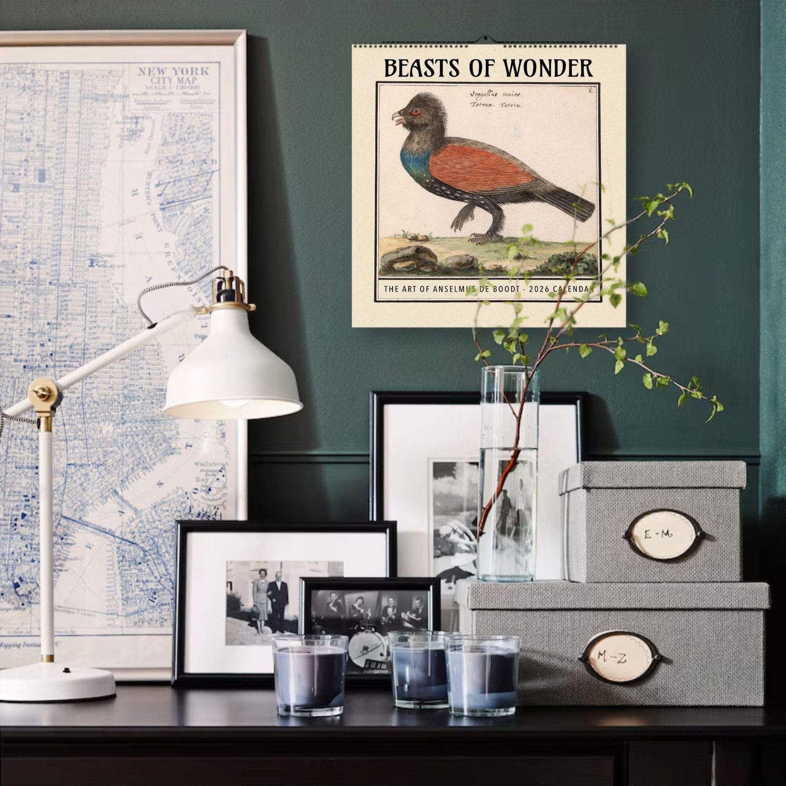 Elegant desk decor with framed pictures and calendar.