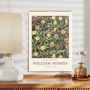 William Morris 2026 calendar on wooden table.