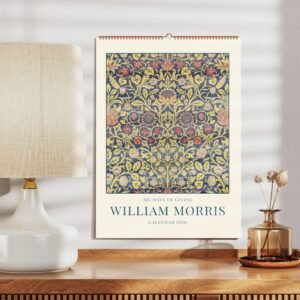 2026 calendar featuring William Morris artwork on table.