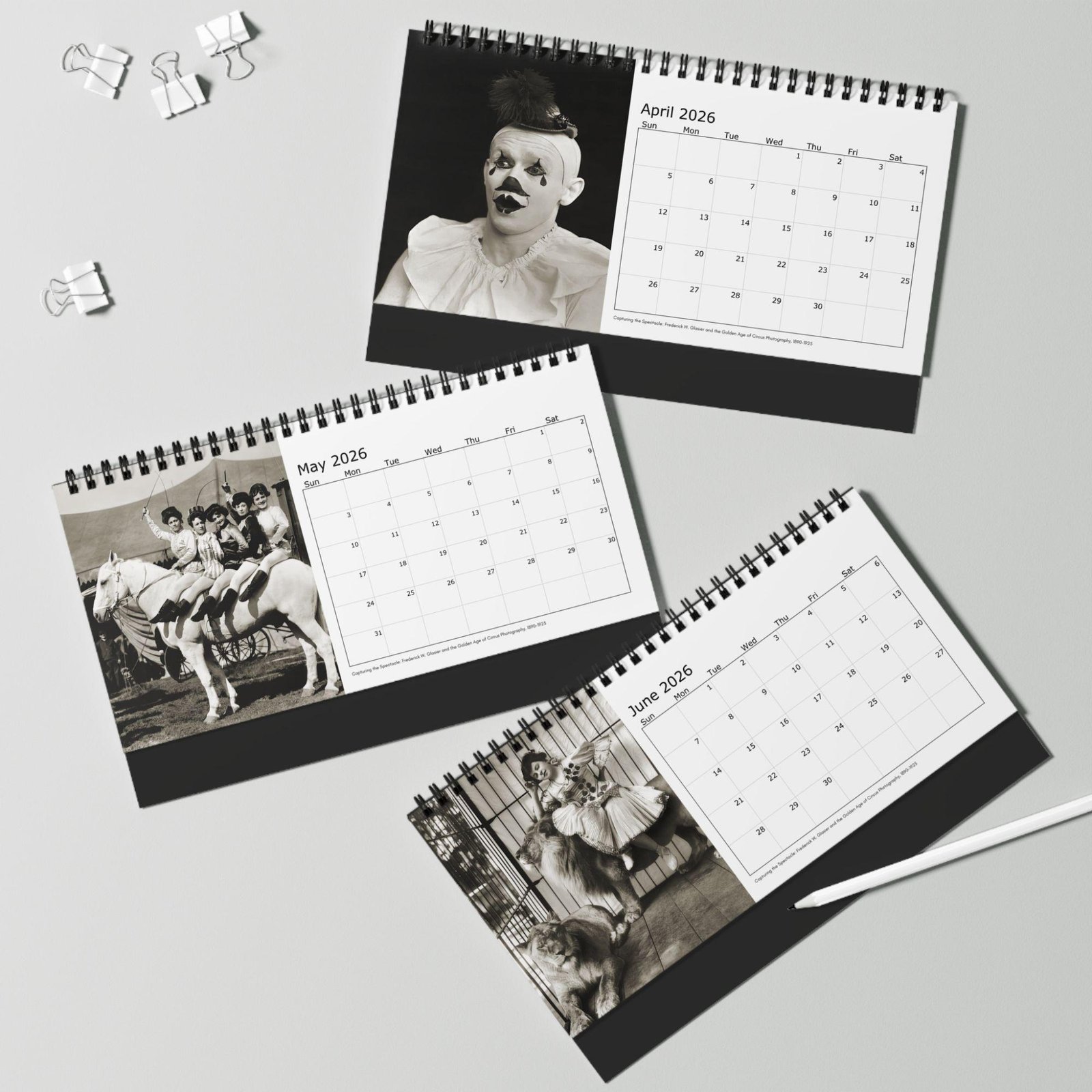 Three vintage-themed 2026 desk calendars with circus photos.