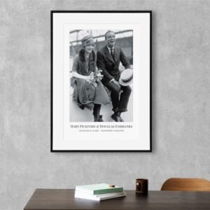 Framed vintage photo of a smiling couple.