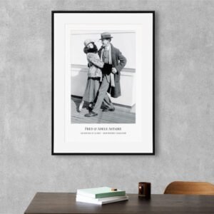 Black and white dancing couple poster on wall.