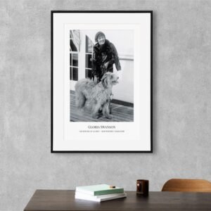 Framed photo of a woman with a dog.