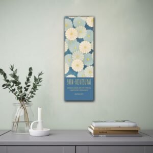 Japanese art book with floral design on wall.