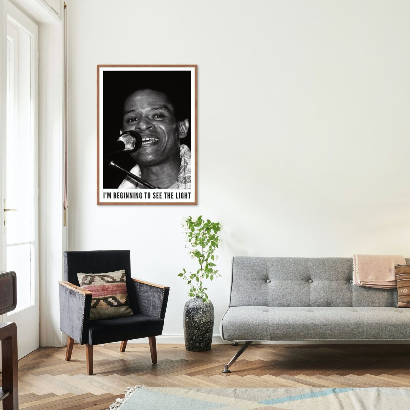 Stylish living room with framed art on wall.