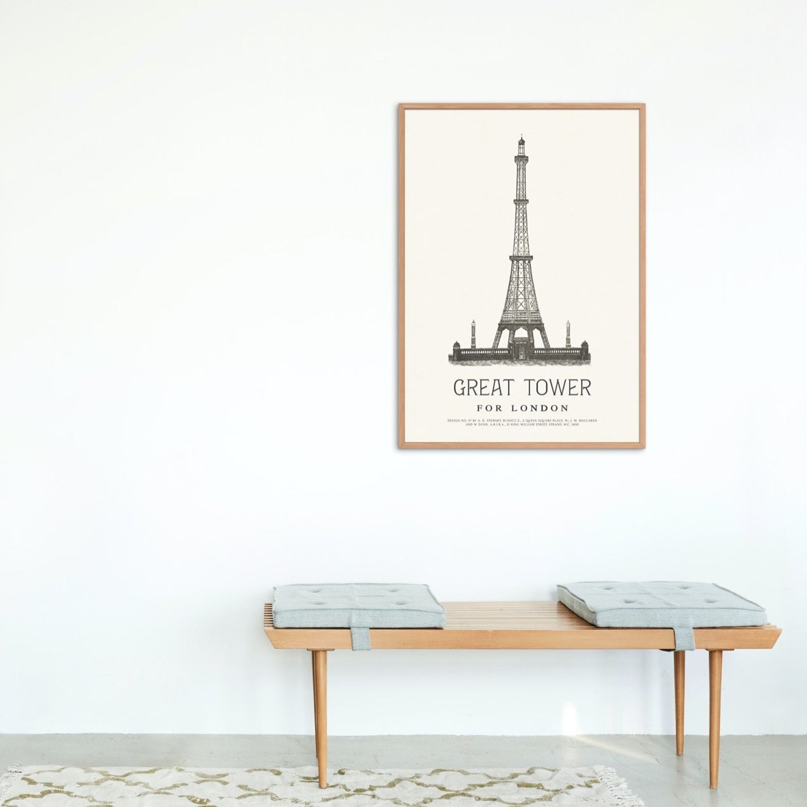 Framed Eiffel Tower poster on white wall