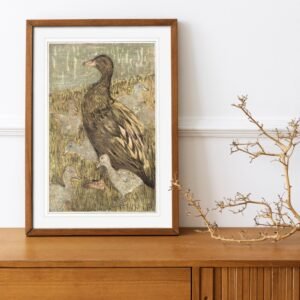 Framed duck painting on wooden cabinet