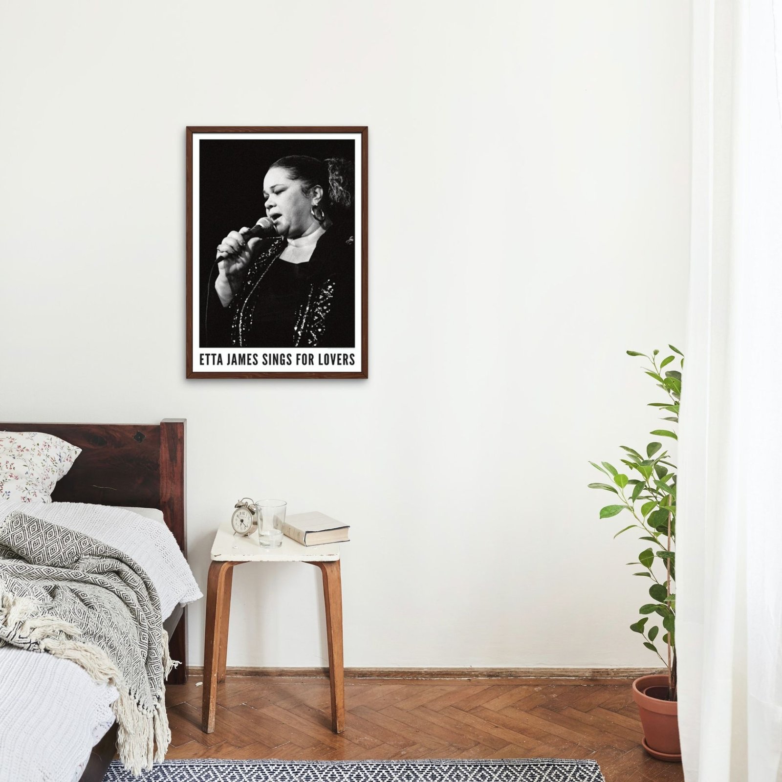 Bedroom with Etta James poster on the wall.