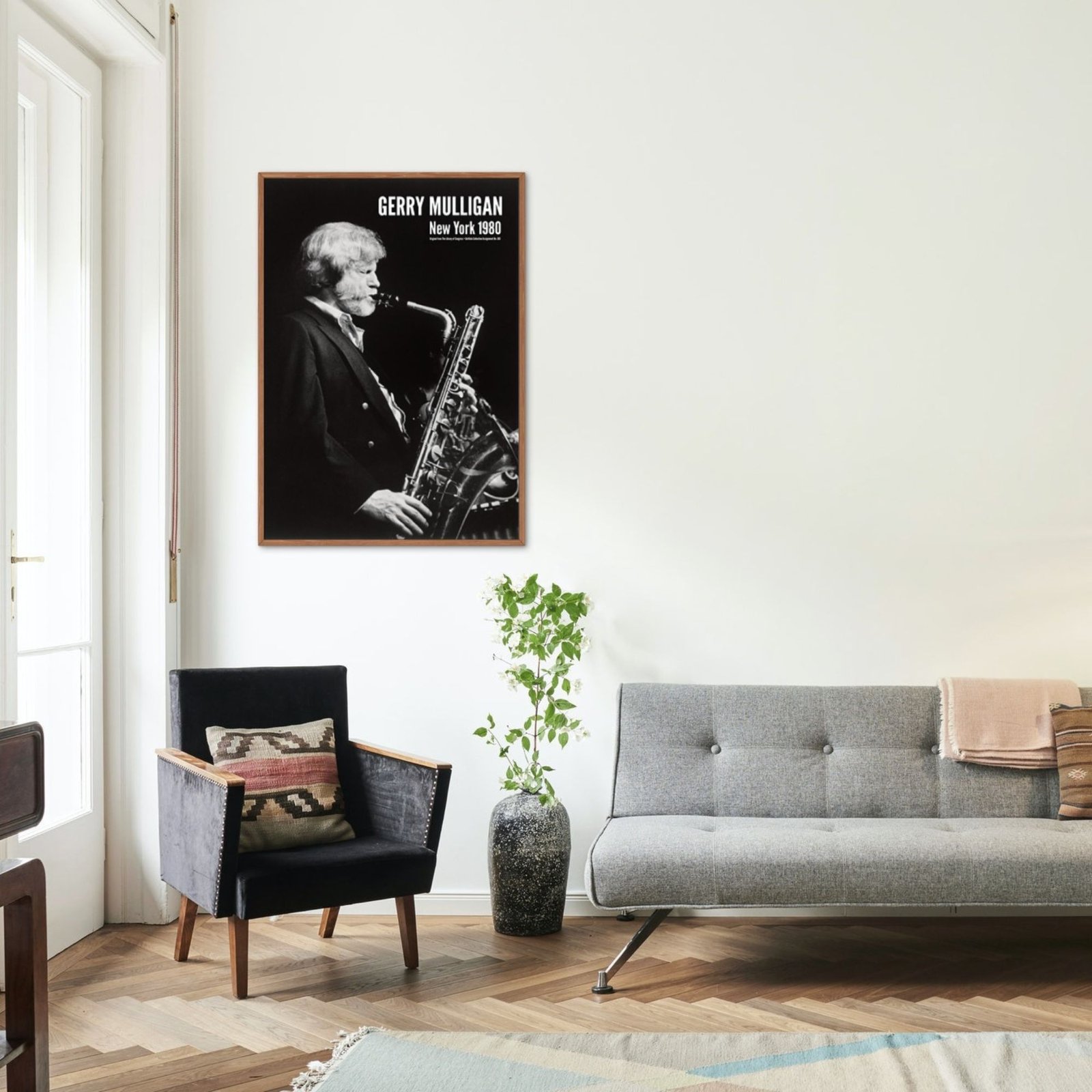 Modern living room with framed saxophonist poster.