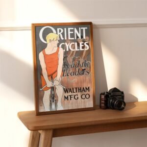 Vintage Orient Cycles poster on wooden shelf.
