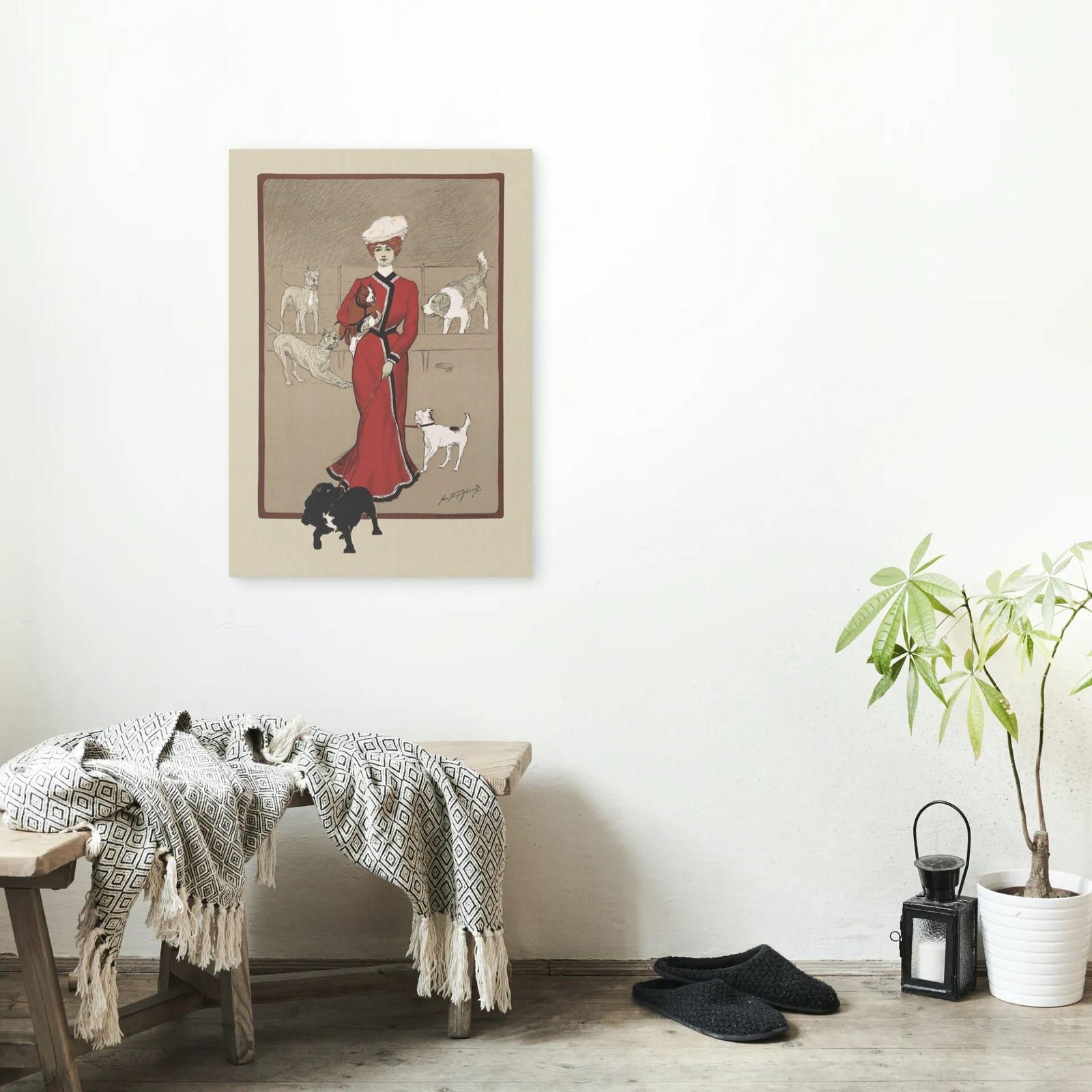 Vintage art of woman with dogs on wall