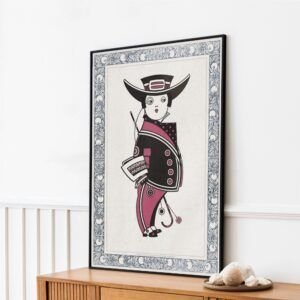 Framed geometric artwork on wooden shelf