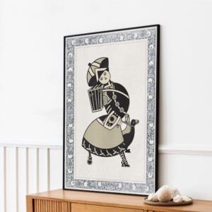 Framed geometric art print on wooden cabinet.