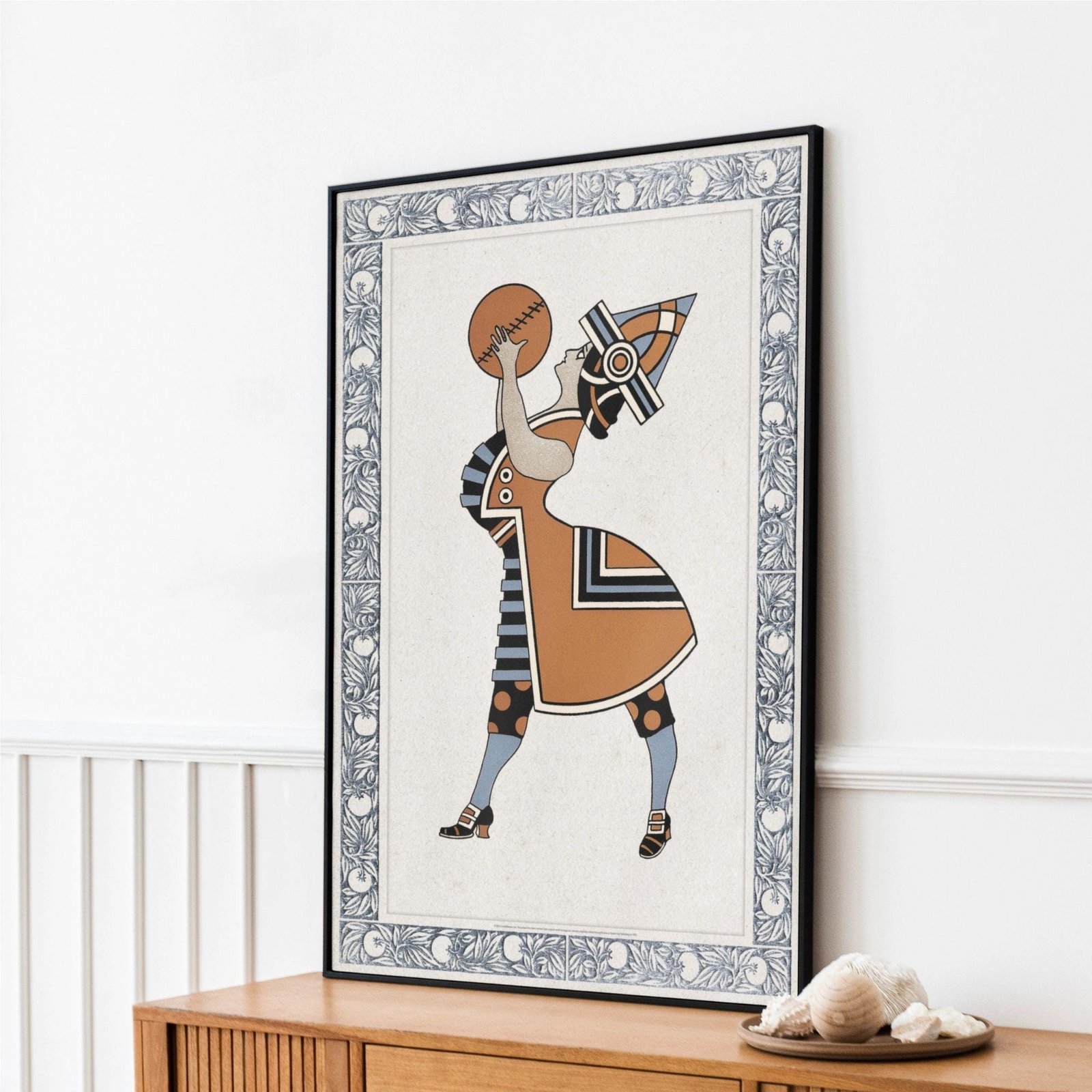 Decorative framed art depicting abstract figure.