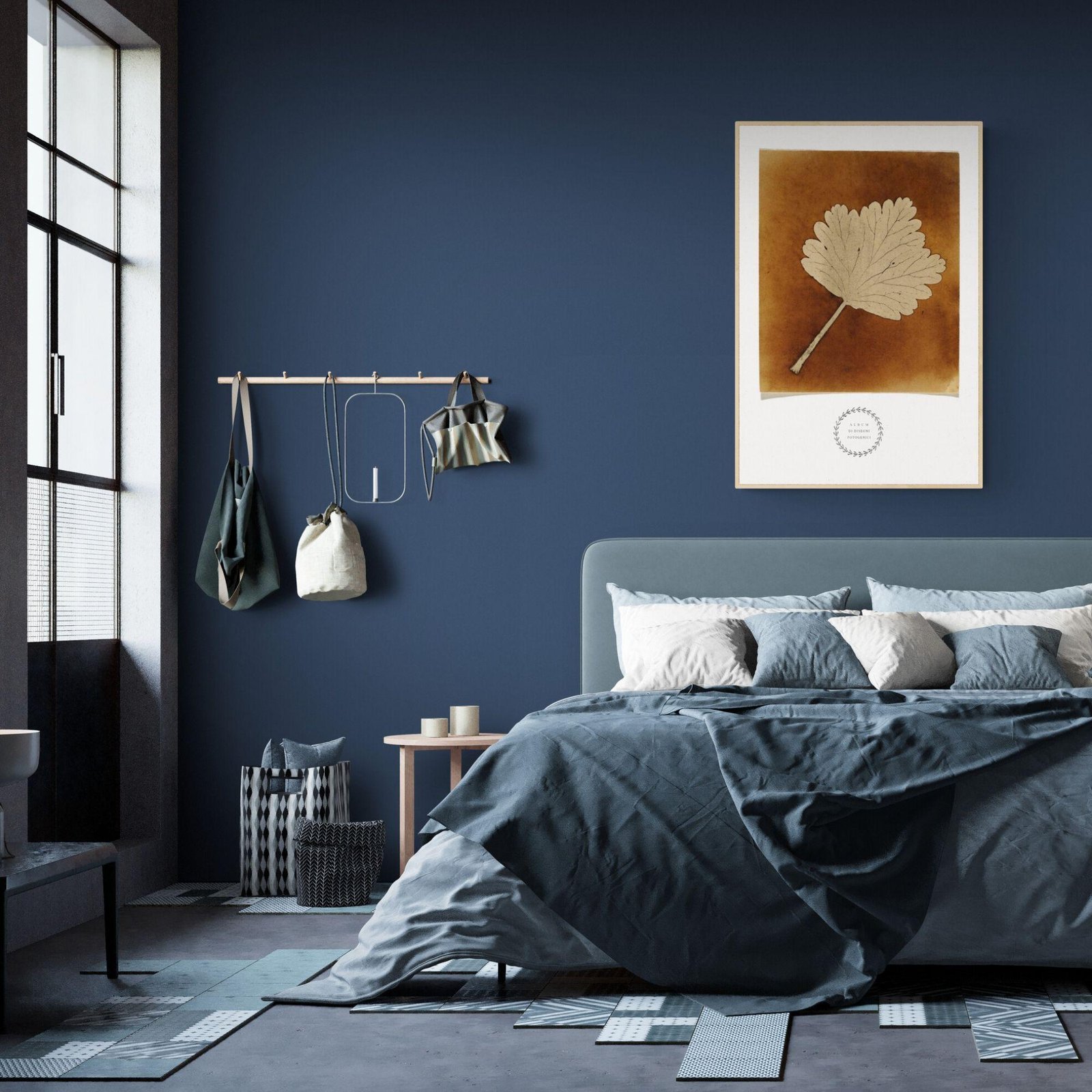 Modern bedroom with blue accents and wall art.