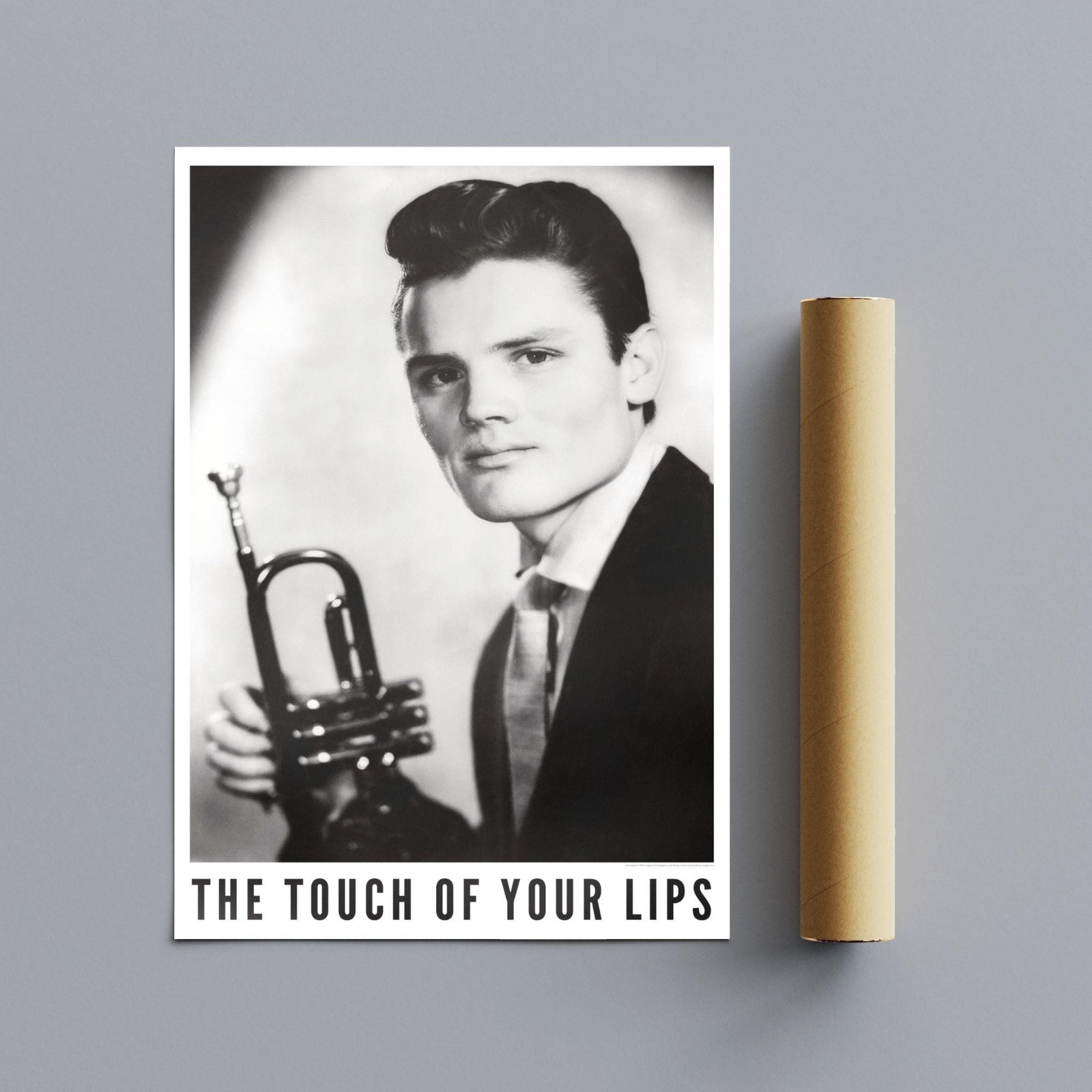 Vintage musician holding a trumpet.