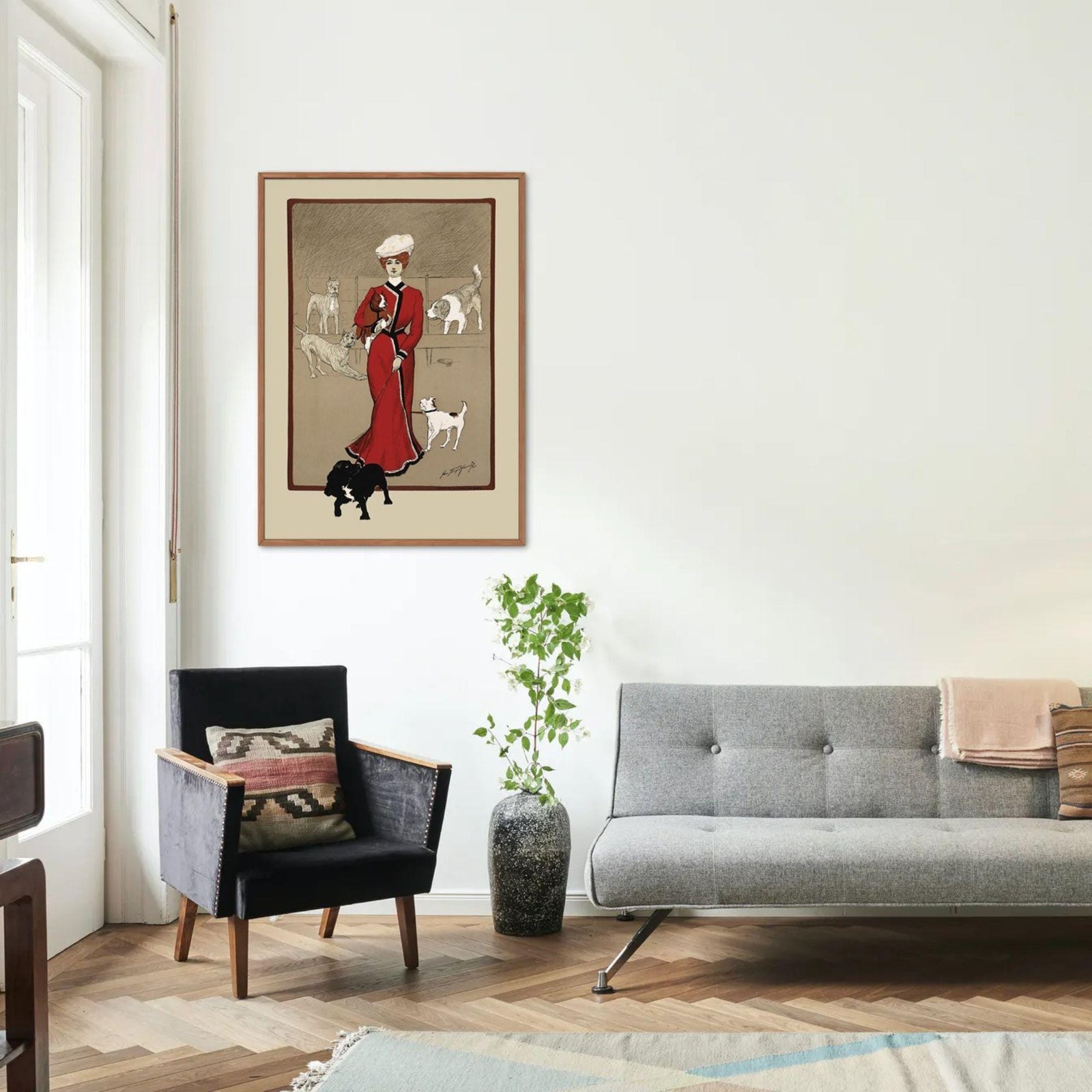 Living room with vintage dog artwork.