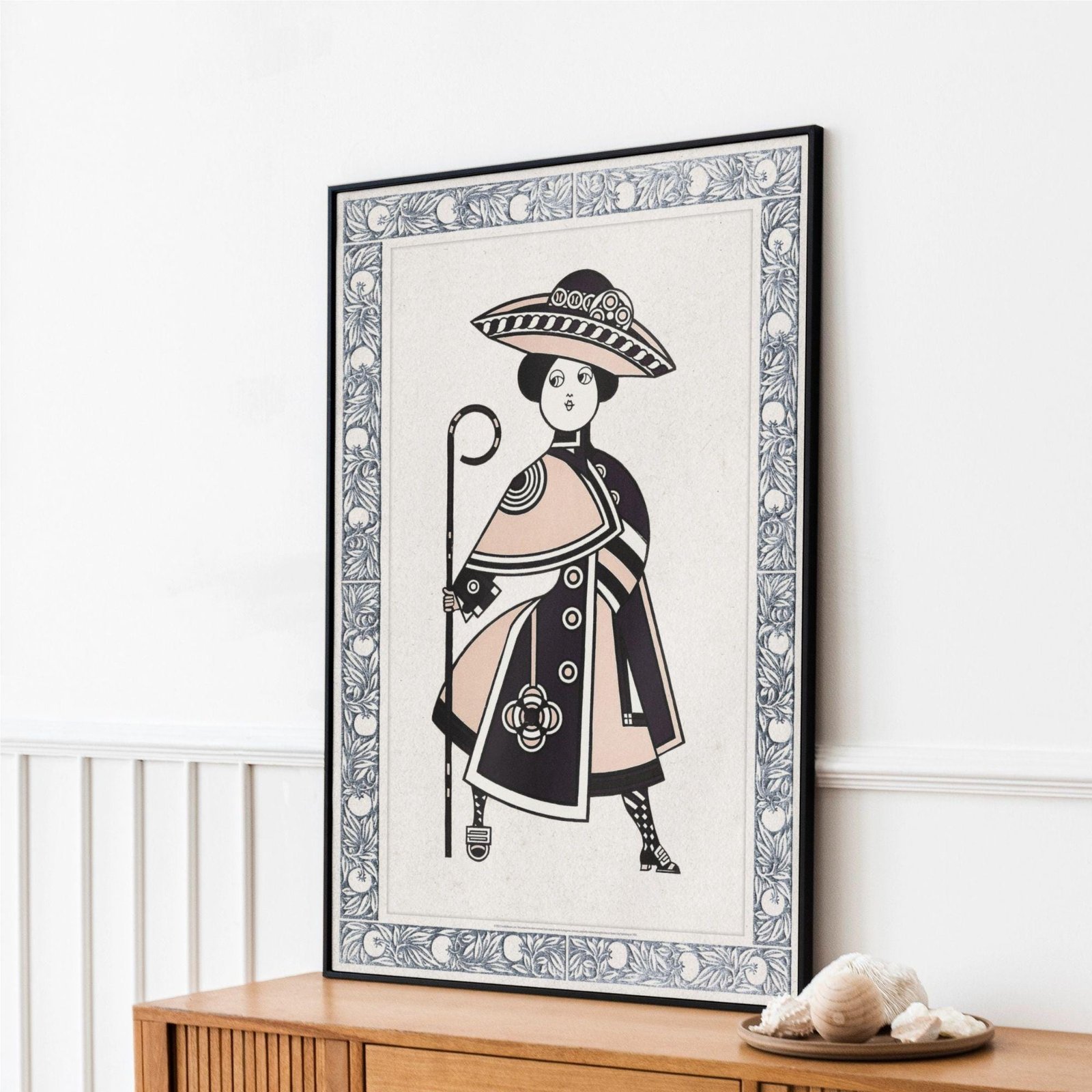 Framed artwork of a stylishly dressed person.