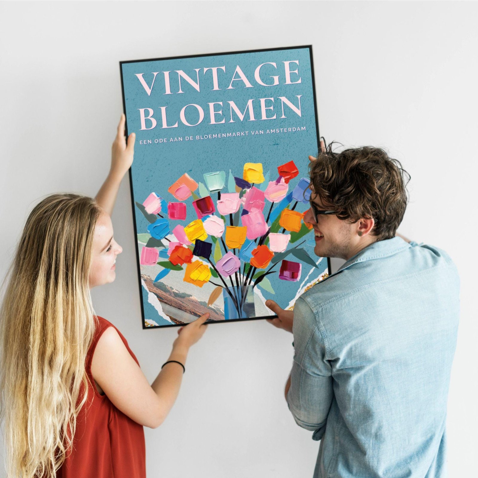 Couple holding colorful vintage flower poster.