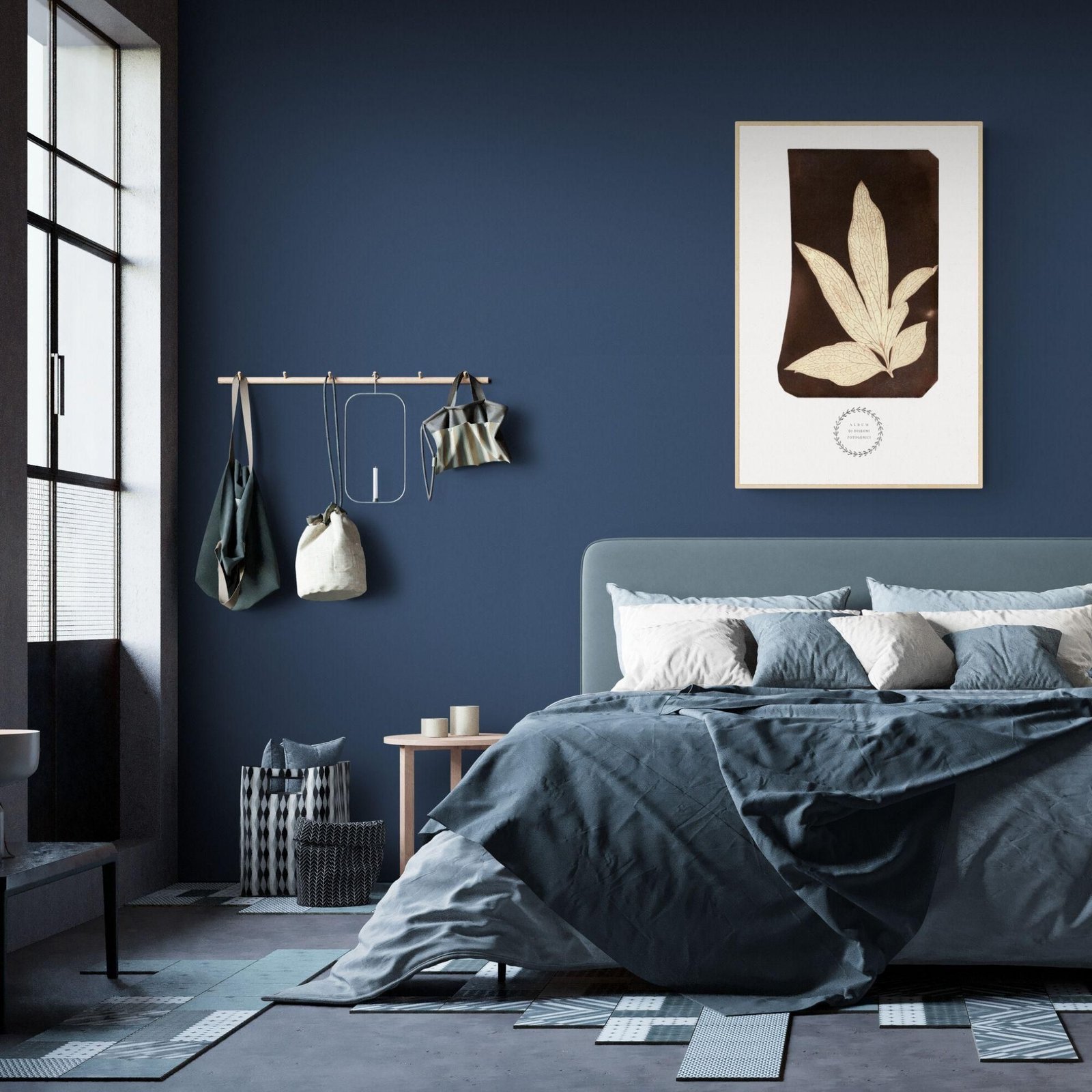 Modern bedroom with blue walls and decor.