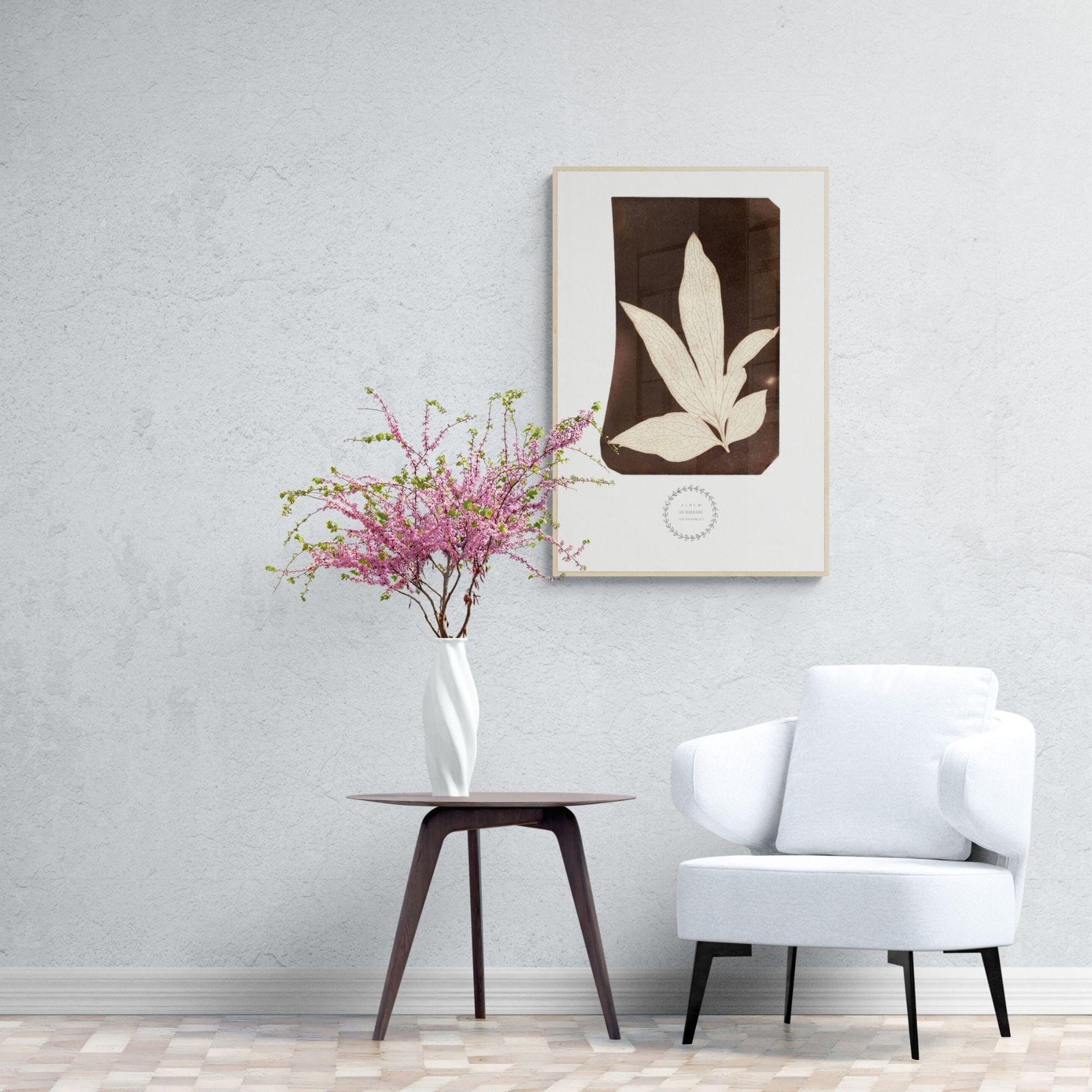 Modern living room with chair, table, and art.