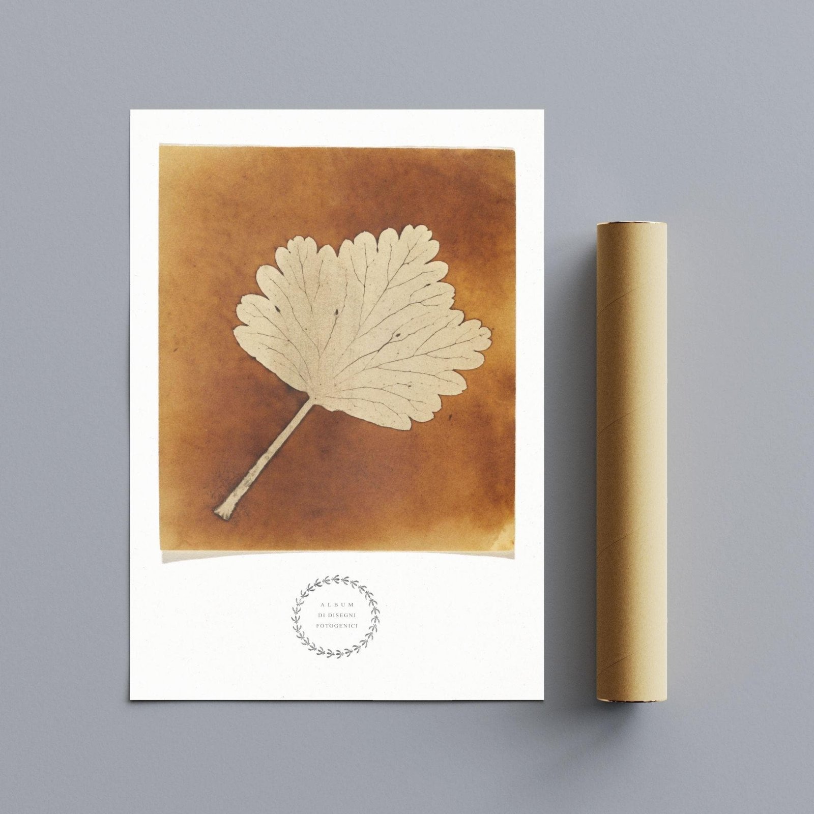 Printed leaf artwork with brown background and scroll.