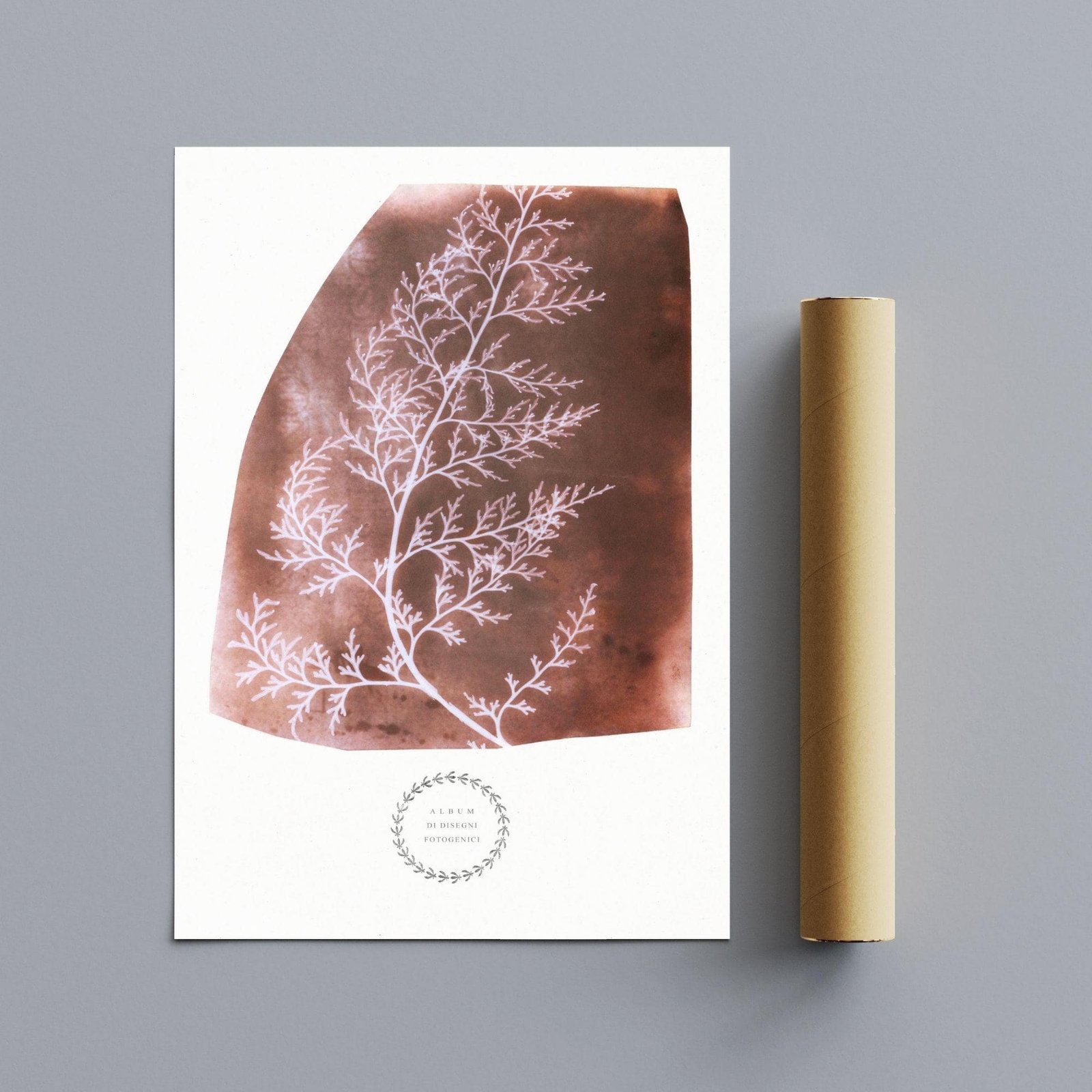 Botanical print with rolled paper tube on gray background.