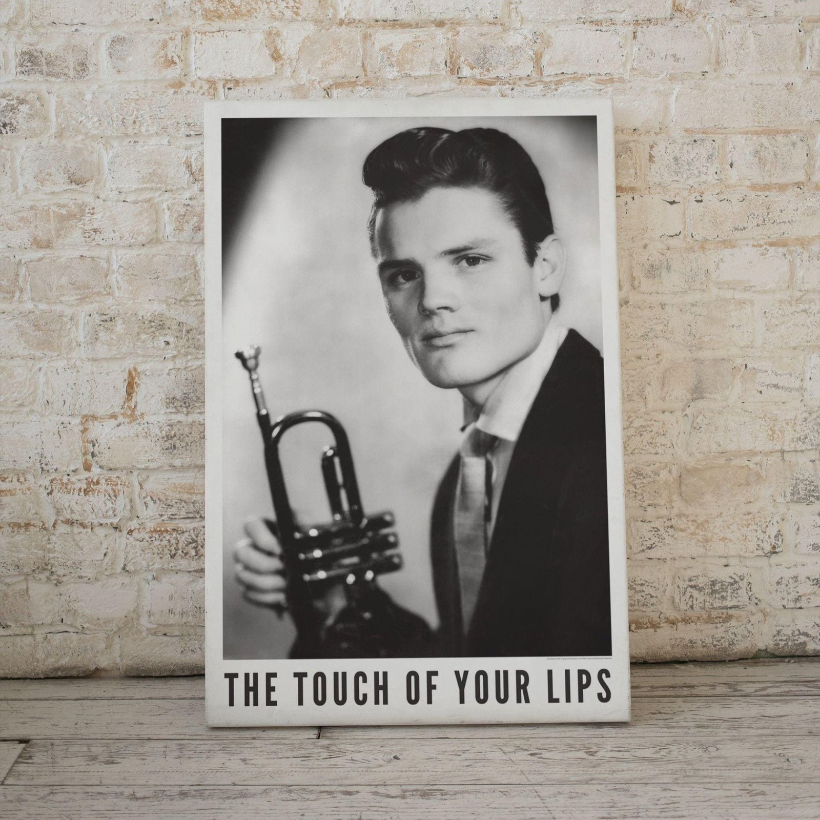 Vintage musician portrait with trumpet, black and white.