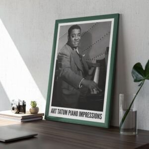 Framed Art Tatum poster on a desk