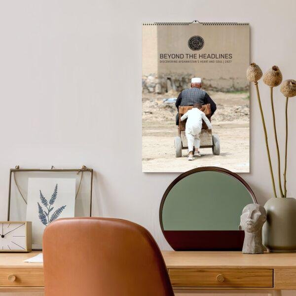 Beyond the Headlines Afghanistan 2027 calendar on wall