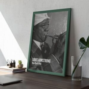 Framed photo of musician playing trumpet, vintage style.