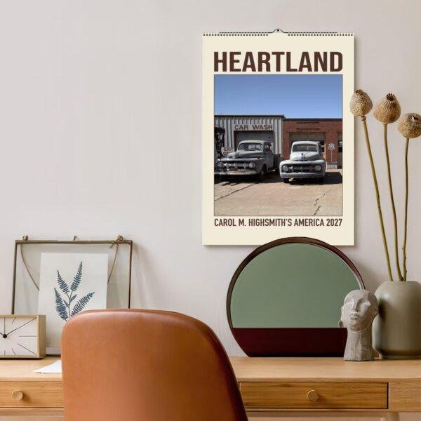 Heartland 2027 wall calendar hanging above stylish desk